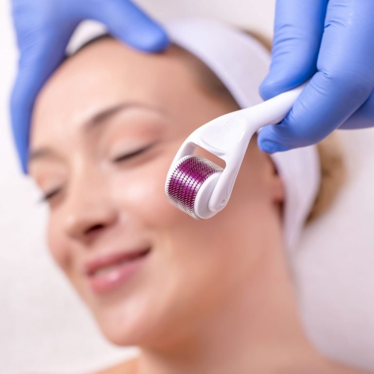 A doctor with rubber gloves doing a plastic face surgery on a happy young female