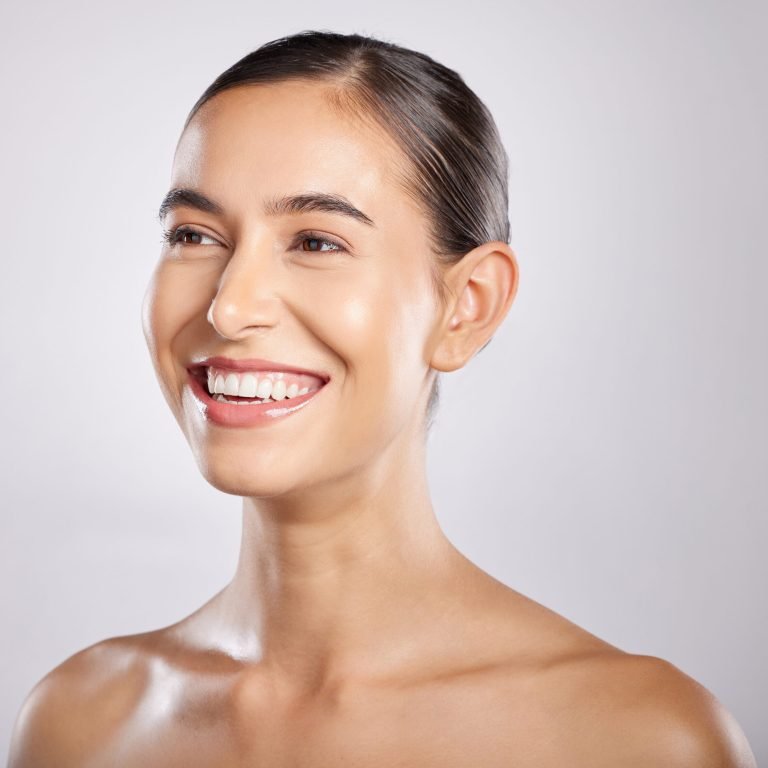 Woman, smile and happy thinking for beauty, skincare wellness and cosmetics dermatology in grey bac.